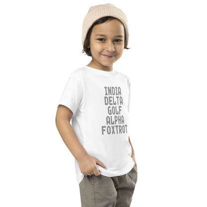 "India Delta Golf Alpha Foxtrot" printed on a white toddler short sleeve tee worn by a male who is also wearing a knit cap