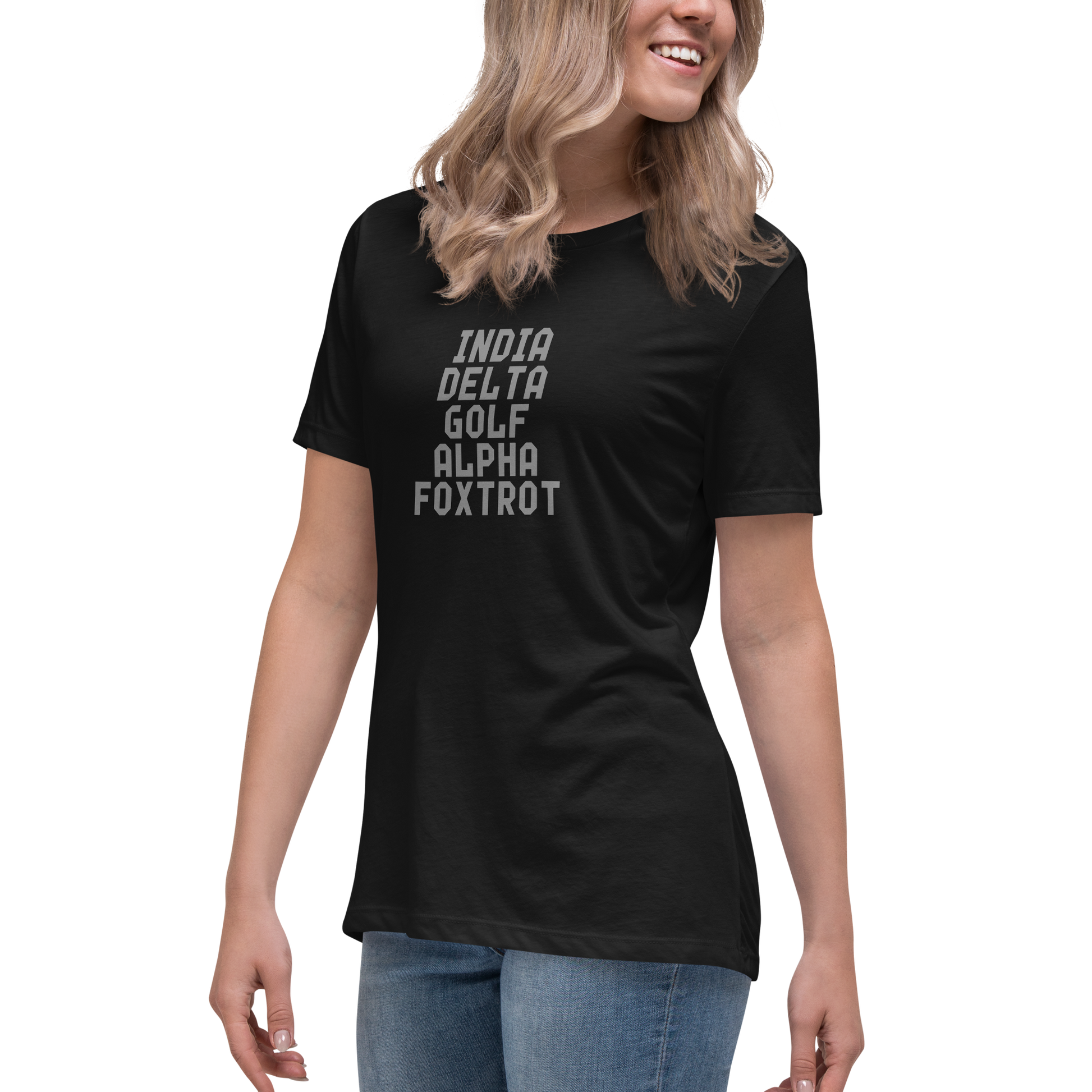 "India Delta Golf Alpha Foxtrot" printed on a black women's relaxed t-shirt worn by a female