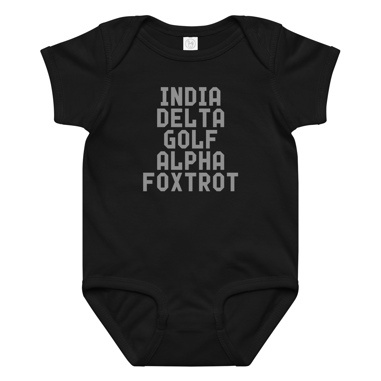 "India Delta Golf Alpha Foxtrot" printed on a black baby jersey bodysuit laying on a flat surface amongst other clothes