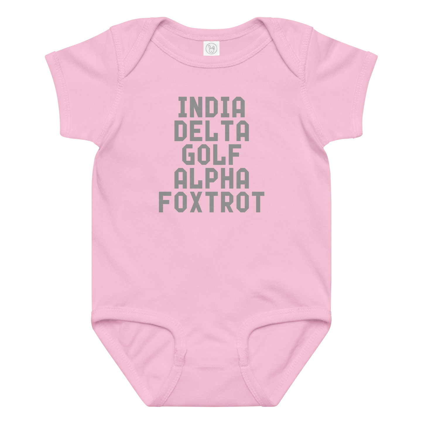"India Delta Golf Alpha Foxtrot" printed on a pink baby jersey bodysuit laying on a flat surface amongst other clothes