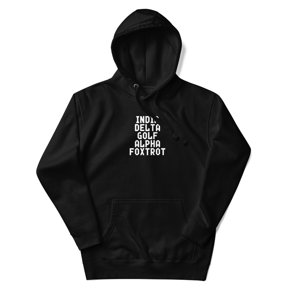 "India Delta Golf Alpha Foxtrot" printed on a black unisex hoodie laying on a flat surface with the hood up