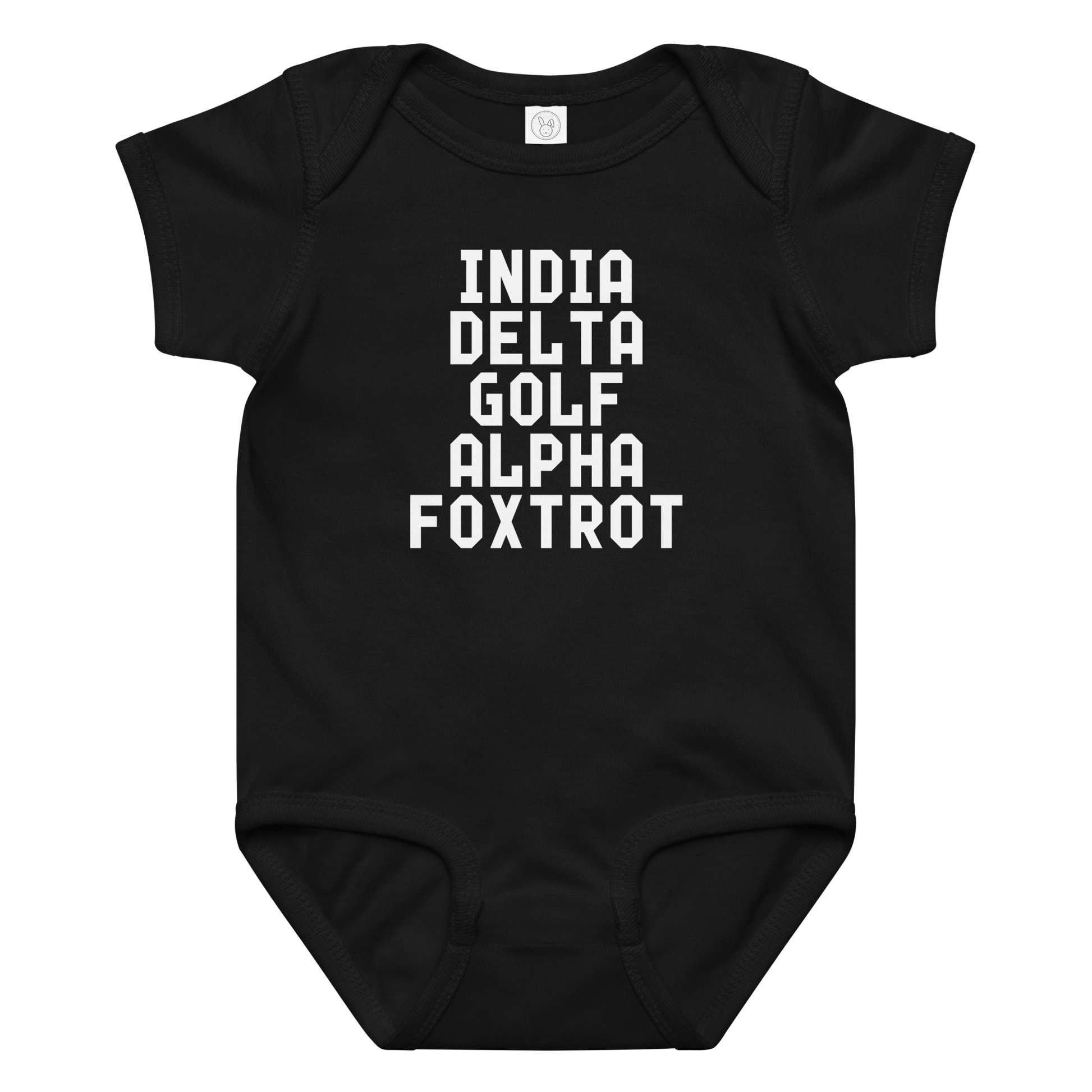 "India Delta Golf Alpha Foxtrot" printed on a black baby jersey bodysuit laying on a flat surface amongst other clothes