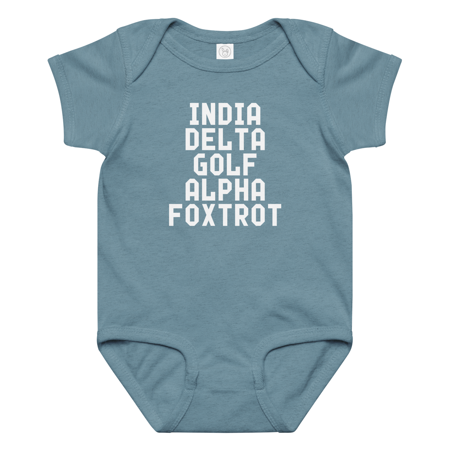 "India Delta Golf Alpha Foxtrot" printed on a vintage indigo baby jersey bodysuit laying on a flat surface amongst other clothes