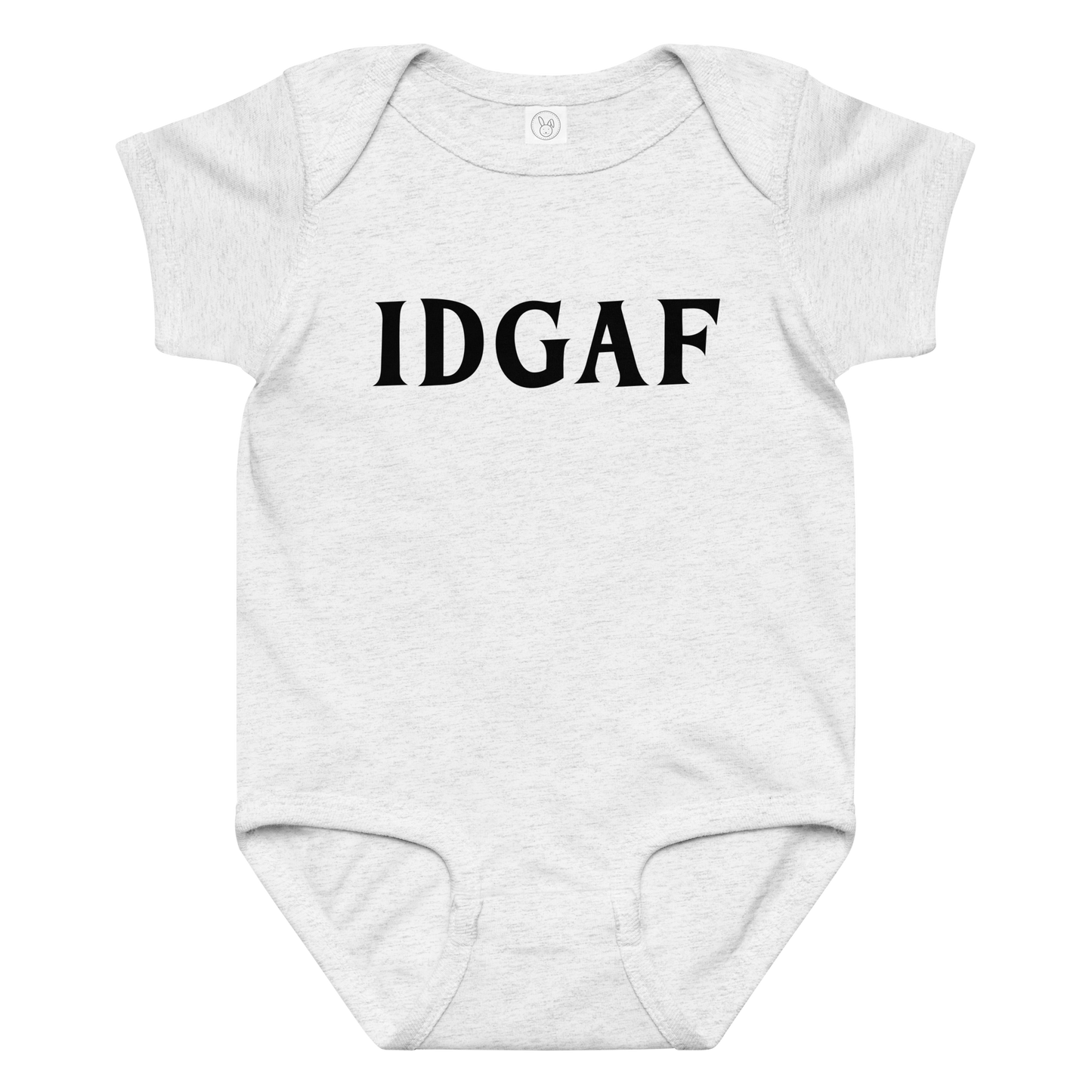 "IDGAF" printed on a ash baby jersey bodysuit laying on a flat surface amongst other clothes