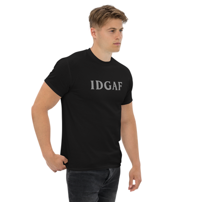 "IDGAF" printed on a black unisex classic tee worn by a male