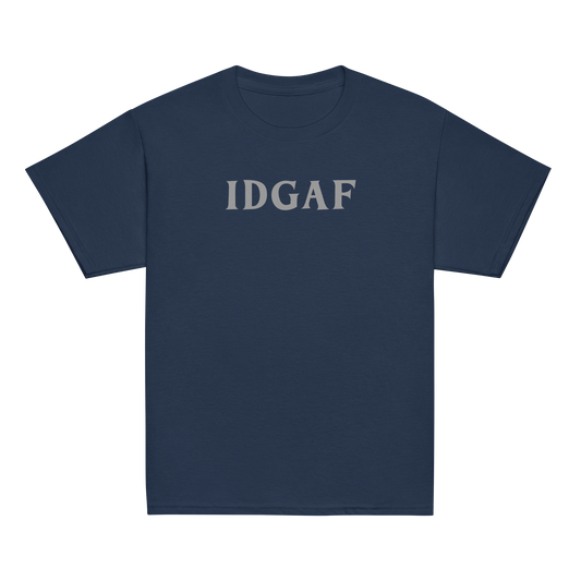 "IDGAF" printed on a navy youth classic tee laying on a flat surface