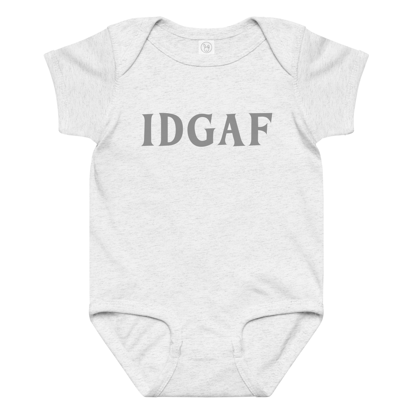 "IDGAF" printed on a ash baby jersey bodysuit laying on a flat surface amongst other clothes