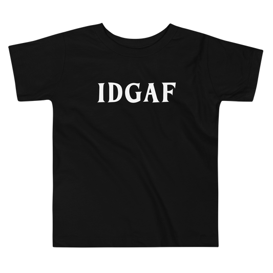 "IDGAF" printed on a black toddler short sleeve tee laying on a flat surface
