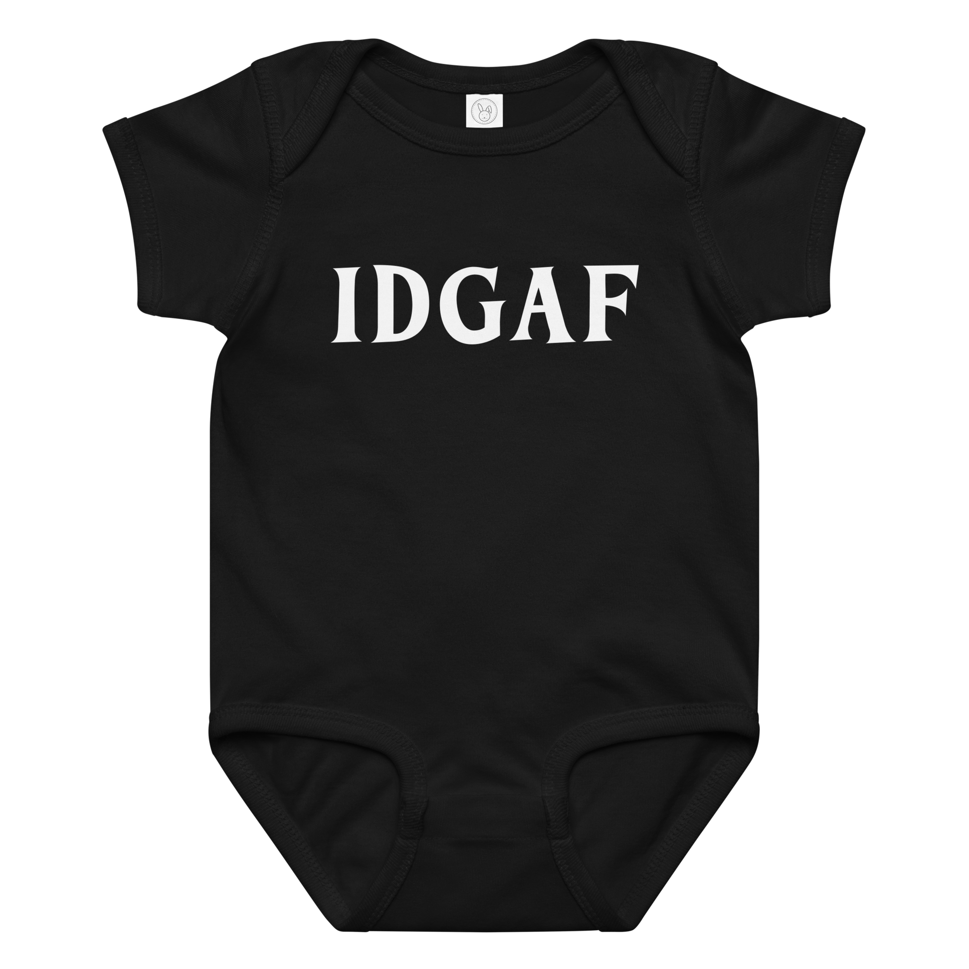 "IDGAF" printed on a black baby jersey bodysuit laying on a flat surface amongst other clothes