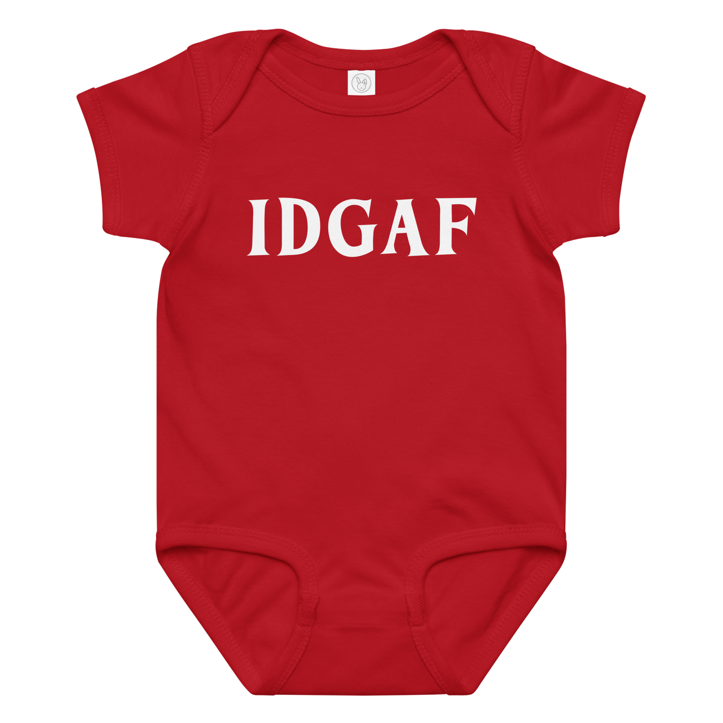 "IDGAF" printed on a red baby jersey bodysuit laying on a flat surface amongst other clothes