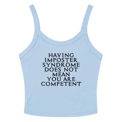 "Having Imposter Syndrome does not mean you are competent" printed on a solid baby blue blend women's micro-rib tanktop laying on a flat surface amongst sunglasses and shorts