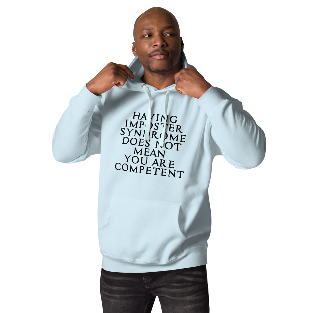 "Having Imposter Syndrome does not mean you are competent" printed on a sky blue unisex hoodie worn by a male