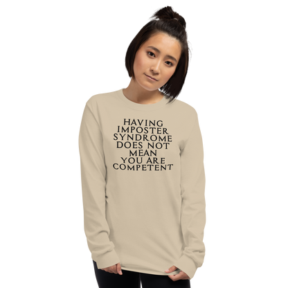 "Having Imposter Syndrome does not mean you are competent" printed on a sand men's long sleeve shirt worn by a female
