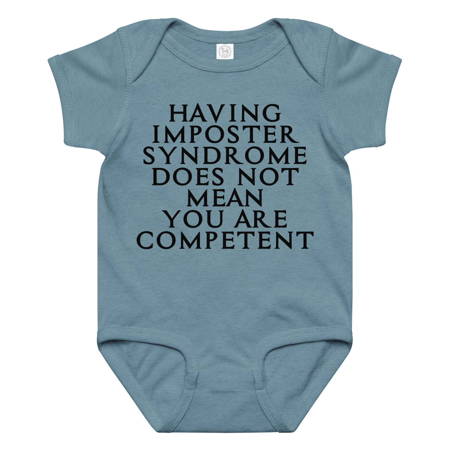 "Having Imposter Syndrome does not mean you are competent" printed on a vintage indigo baby jersey bodysuit laying on a flat surface amongst other clothes