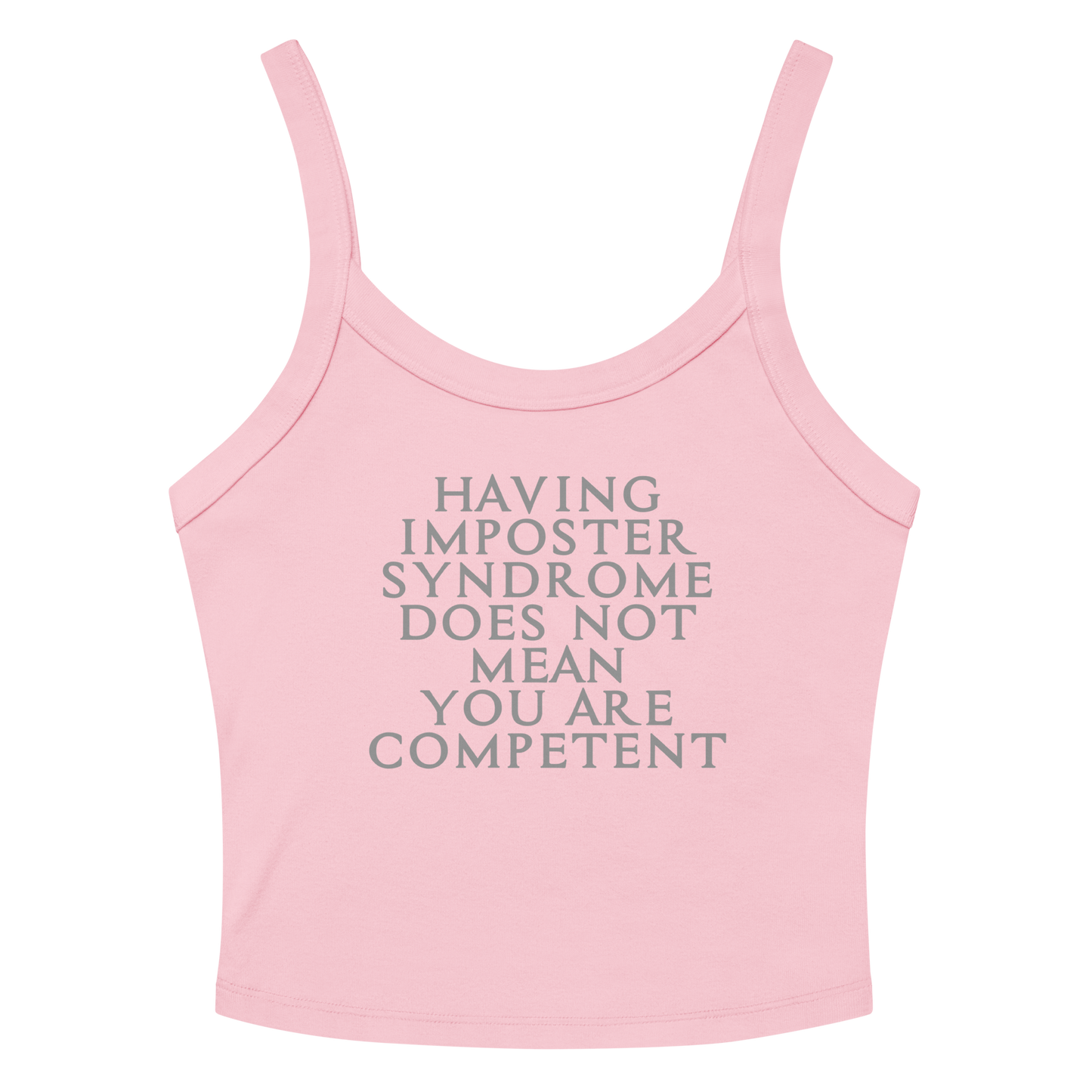 "Having Imposter Syndrome does not mean you are competent" printed on a solid pink blend women's micro-rib tanktop laying on a flat surface amongst sunglasses and shorts