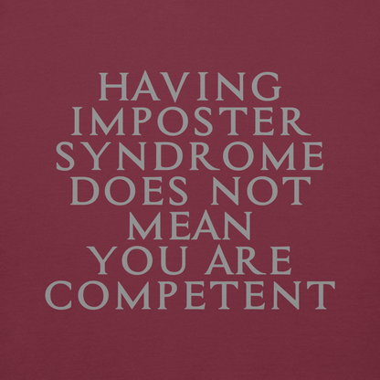 "Having Imposter Syndrome does not mean you are competent" printed on a maroon background