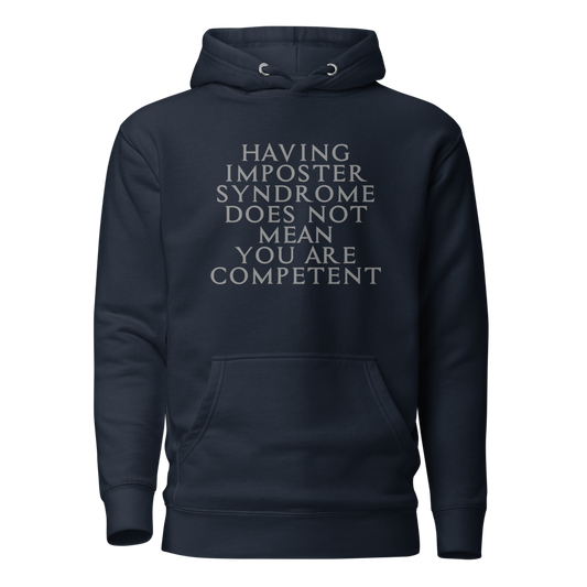 "Having Imposter Syndrome does not mean you are competent" printed on a navy blazer on an invisible / simulated body