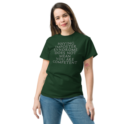 "Having Imposter Syndrome does not mean you are competent" printed on a forest green unisex classic tee worn by a female