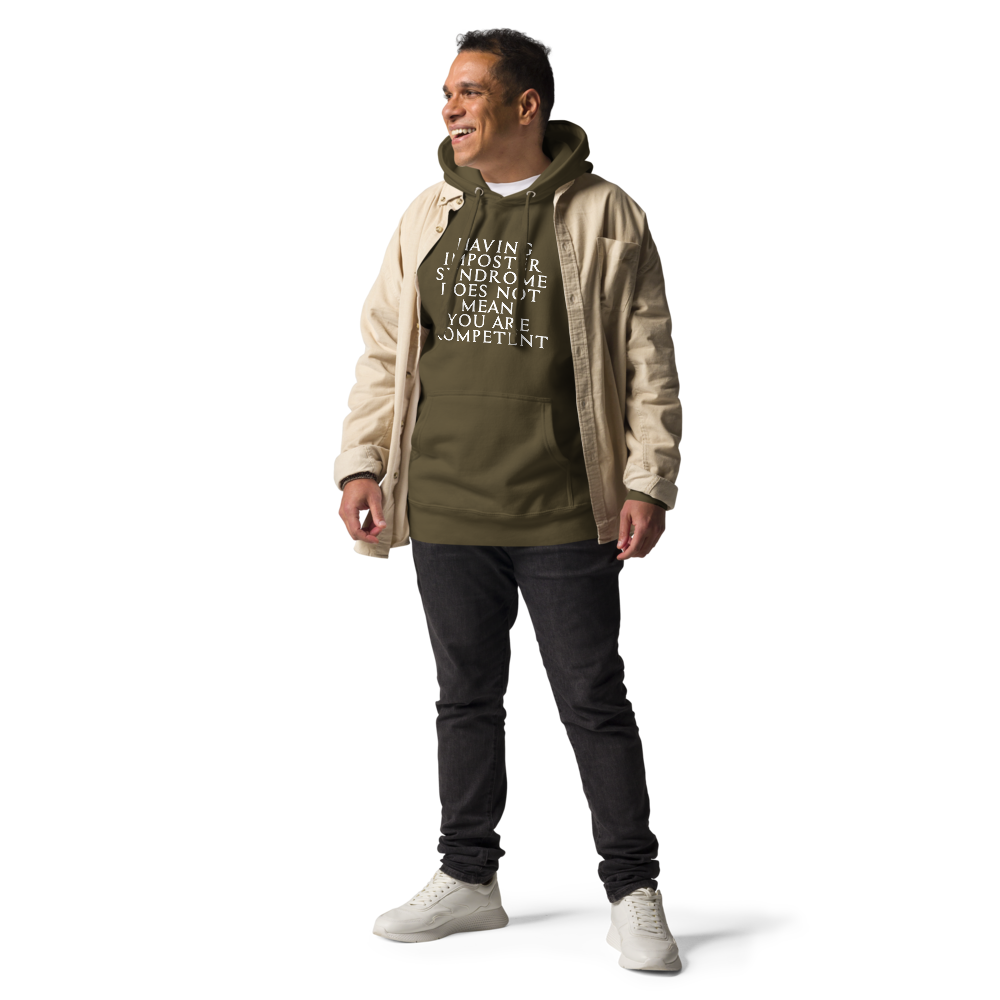 "Having Imposter Syndrome does not mean you are competent" printed on a military green unisex hoodie worn by a male with a jacket on top