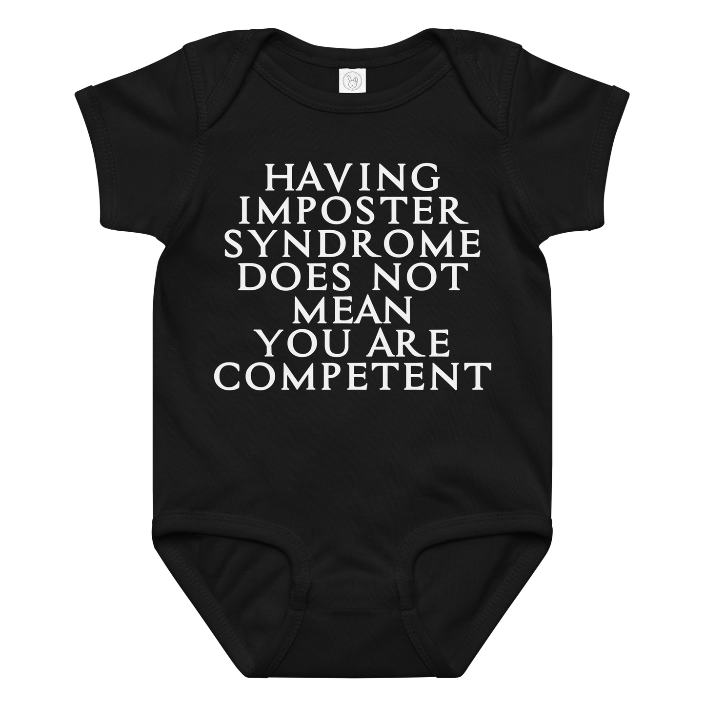 "Having Imposter Syndrome does not mean you are competent" printed on a black baby jersey bodysuit laying on a flat surface amongst other clothes