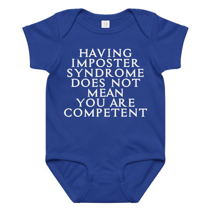 "Having Imposter Syndrome does not mean you are competent" printed on a royal baby jersey bodysuit laying on a flat surface amongst other clothes