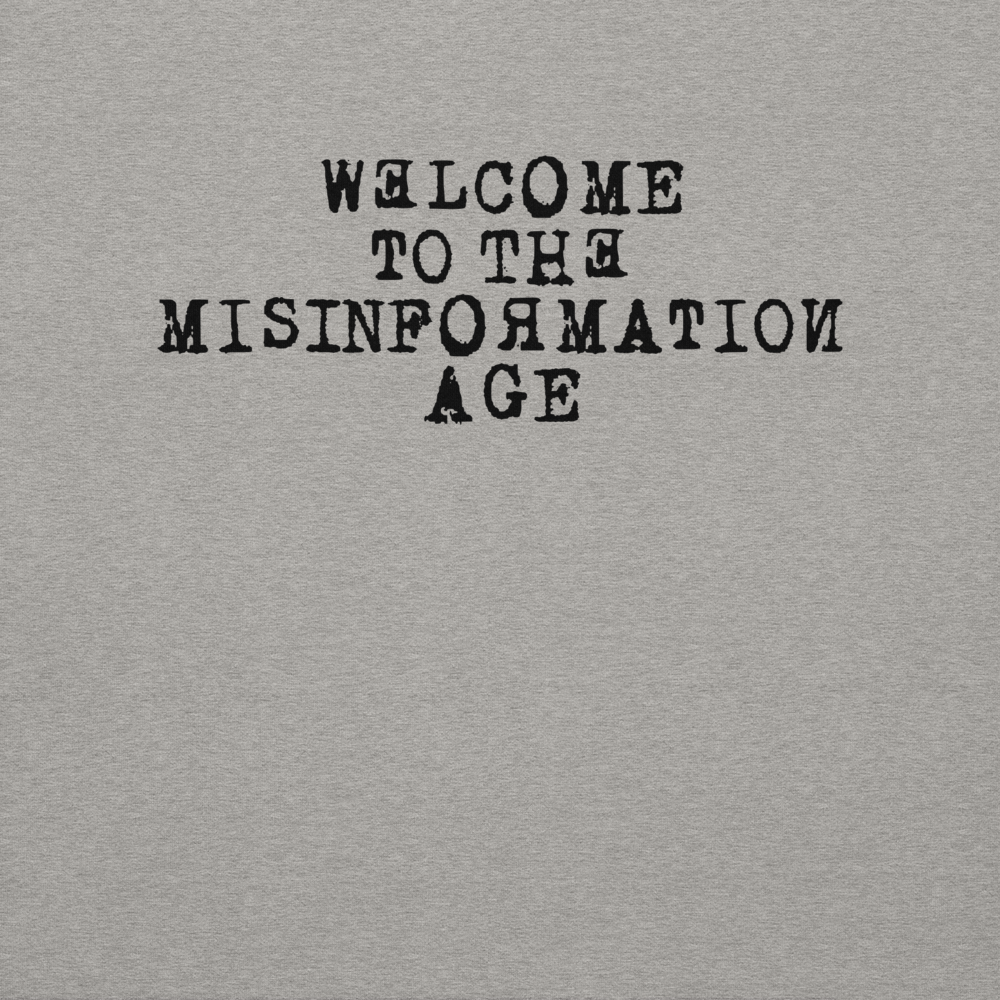 "Welcome to the misinformation age" printed on a carbon grey background