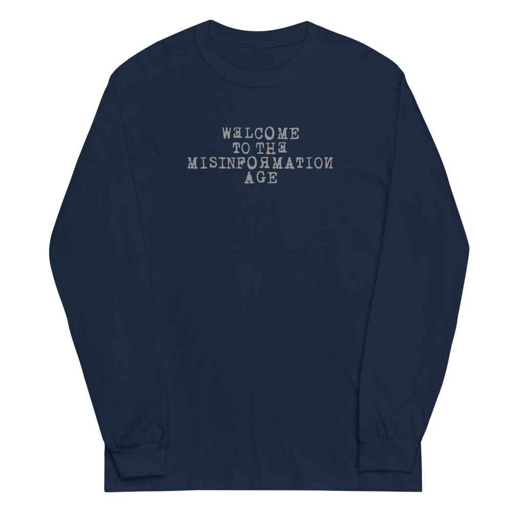 "Welcome to the misinformation age" printed on a navy men's long sleeve shirt laying on a flat surface