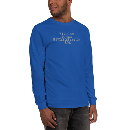 "Welcome to the misinformation age" printed on a royal men's long sleeve shirt worn by a male