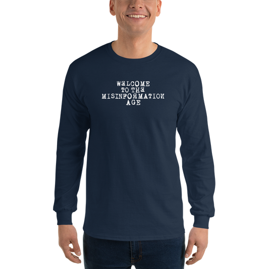 "Welcome to the misinformation age" printed on a navy men's long sleeve shirt worn by a male