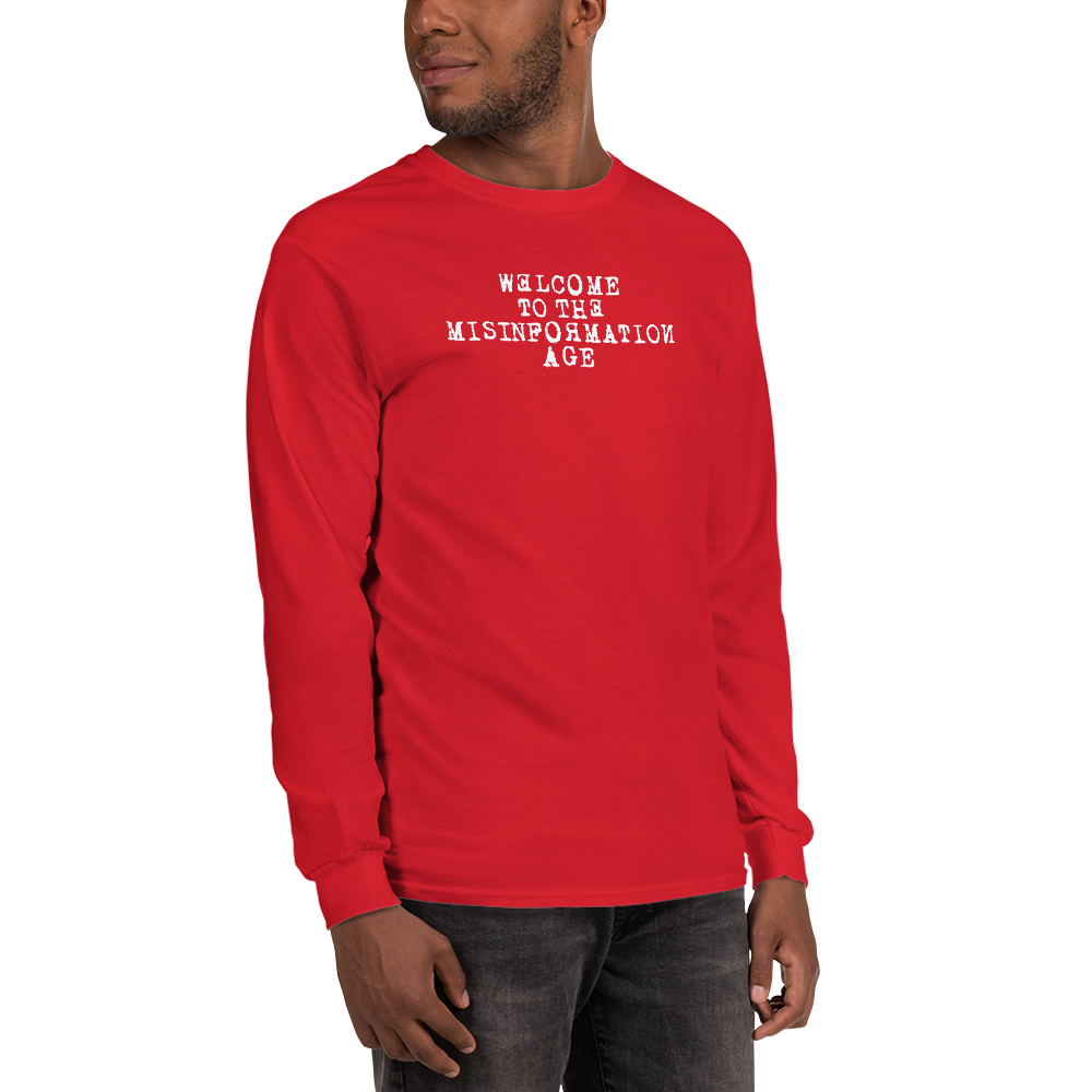 "Welcome to the misinformation age" printed on a red men's long sleeve shirt worn by a male