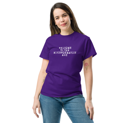 "Welcome to the misinformation age" printed on a purple unisex classic tee worn by a female