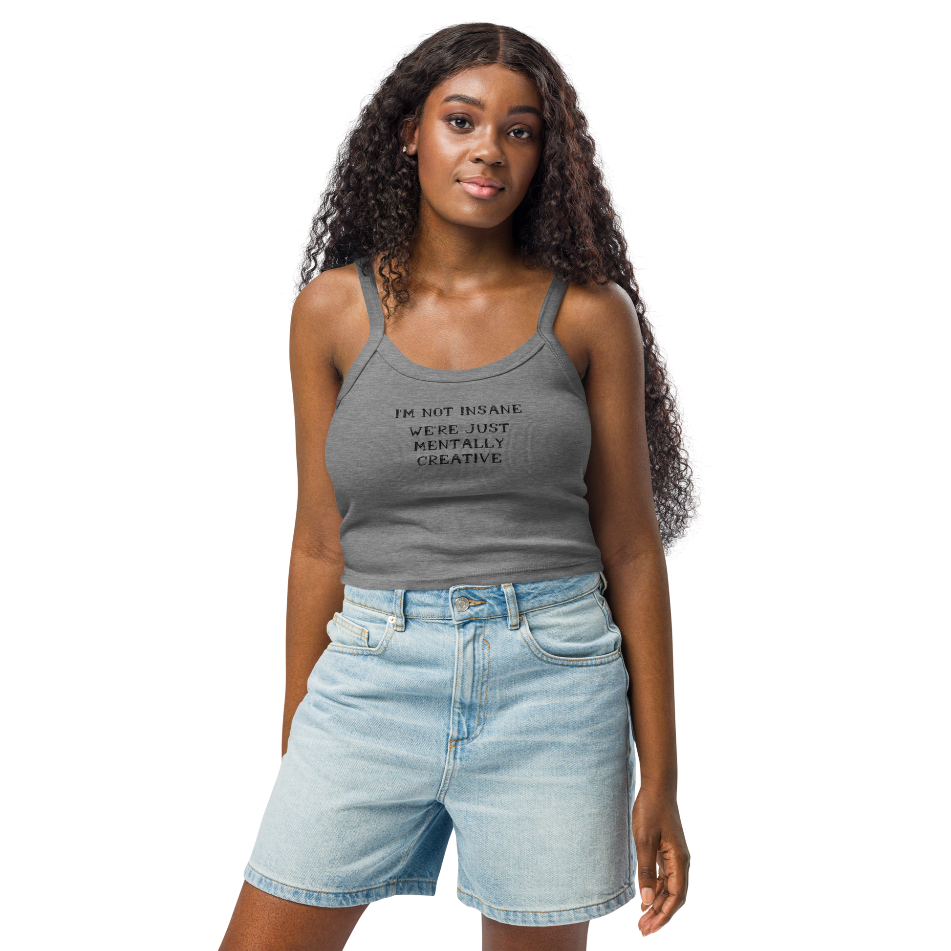 "I’m not insane   We’re just mentally creative" printed on a athletic heather women's micro-rib tanktop worn by a female
