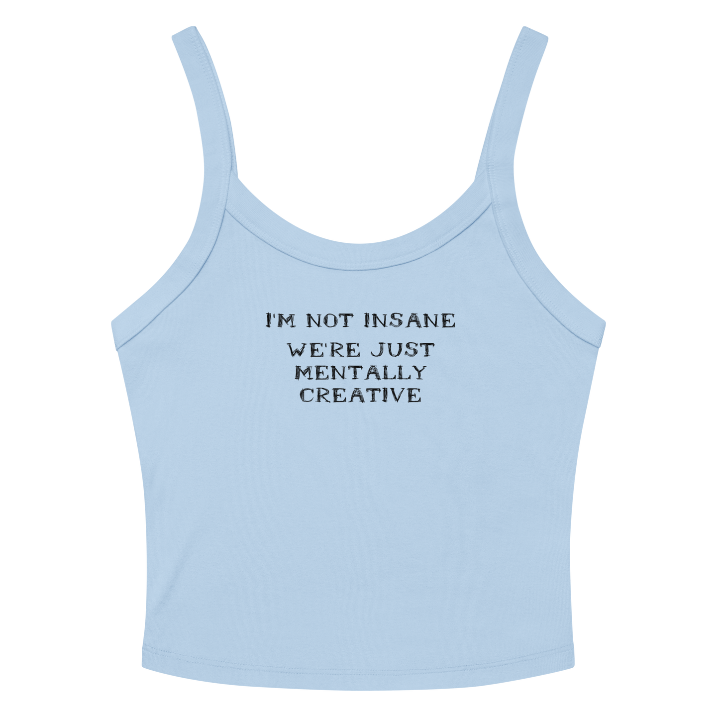 "I’m not insane   We’re just mentally creative" printed on a solid baby blue blend women's micro-rib tanktop laying on a flat surface amongst sunglasses and shorts