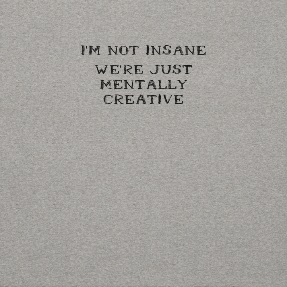 "I’m not insane   We’re just mentally creative" printed on a carbon grey background