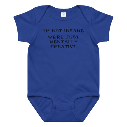 "I’m not insane   We’re just mentally creative" printed on a royal baby jersey bodysuit laying on a flat surface amongst other clothes