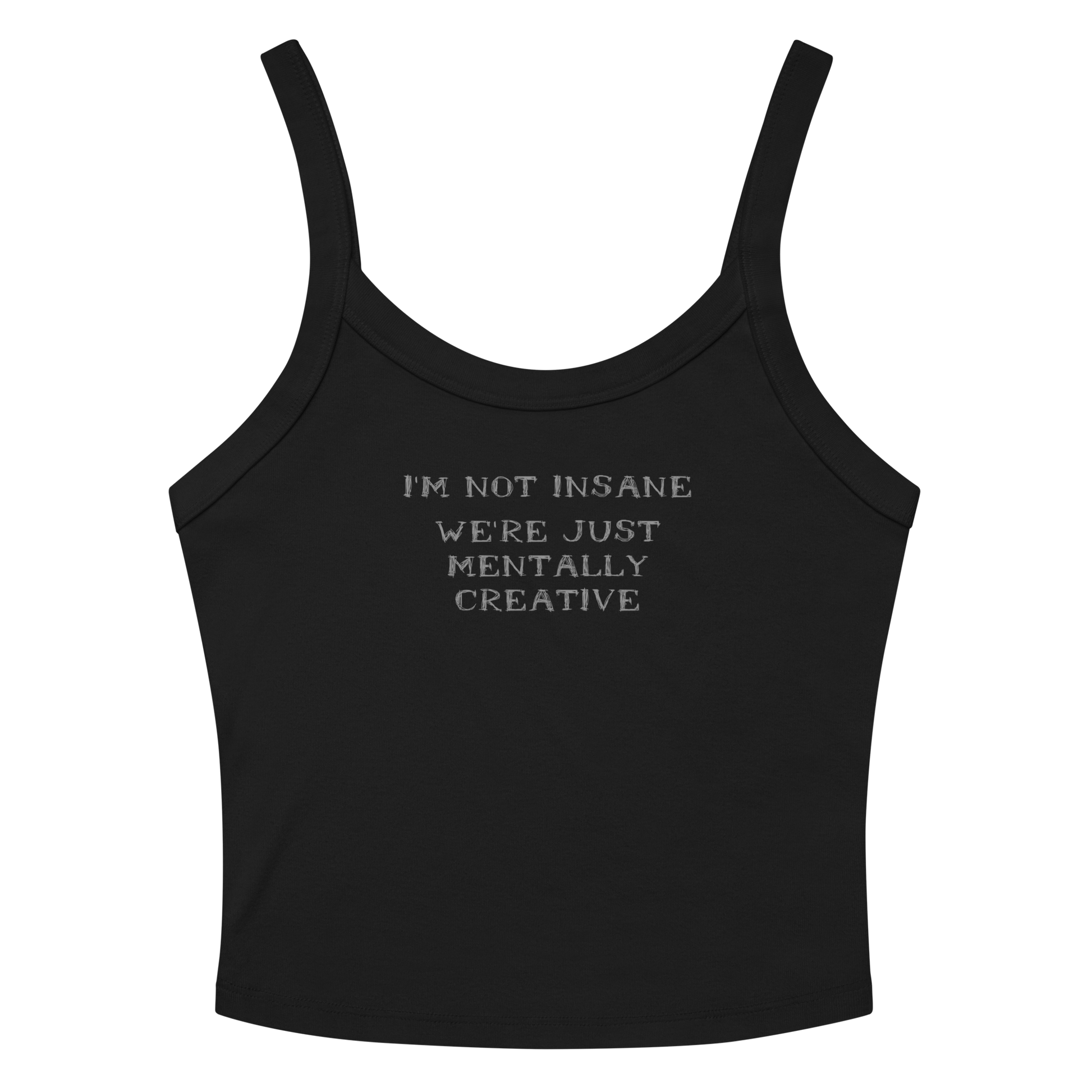 "I’m not insane   We’re just mentally creative" printed on a solid black blend women's micro-rib tanktop laying on a flat surface amongst sunglasses and shorts
