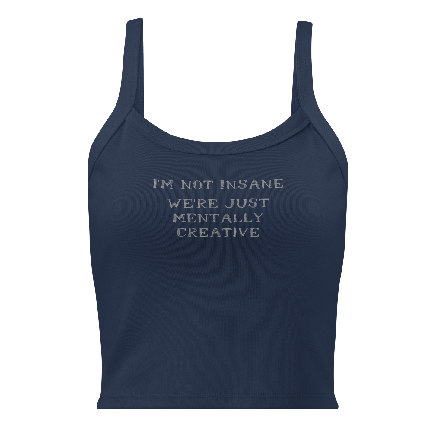 "I’m not insane   We’re just mentally creative" printed on a solid navy blend women's micro-rib tanktop laying on a flat surface