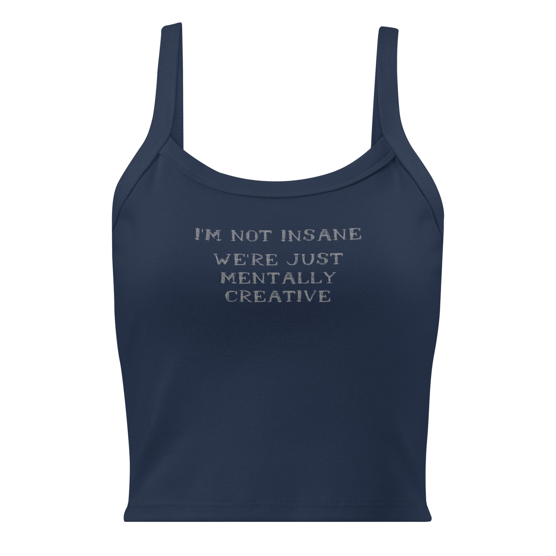 "I’m not insane   We’re just mentally creative" printed on a solid navy blend women's micro-rib tanktop laying on a flat surface