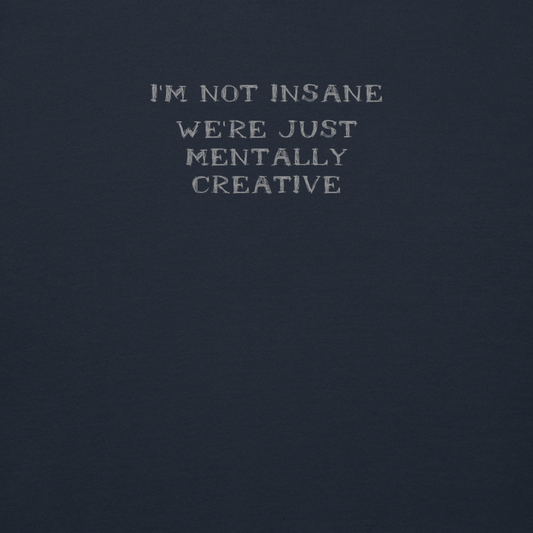 "I’m not insane   We’re just mentally creative" printed on a navy blazer background