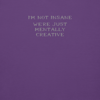 "I’m not insane   We’re just mentally creative" printed on a purple background