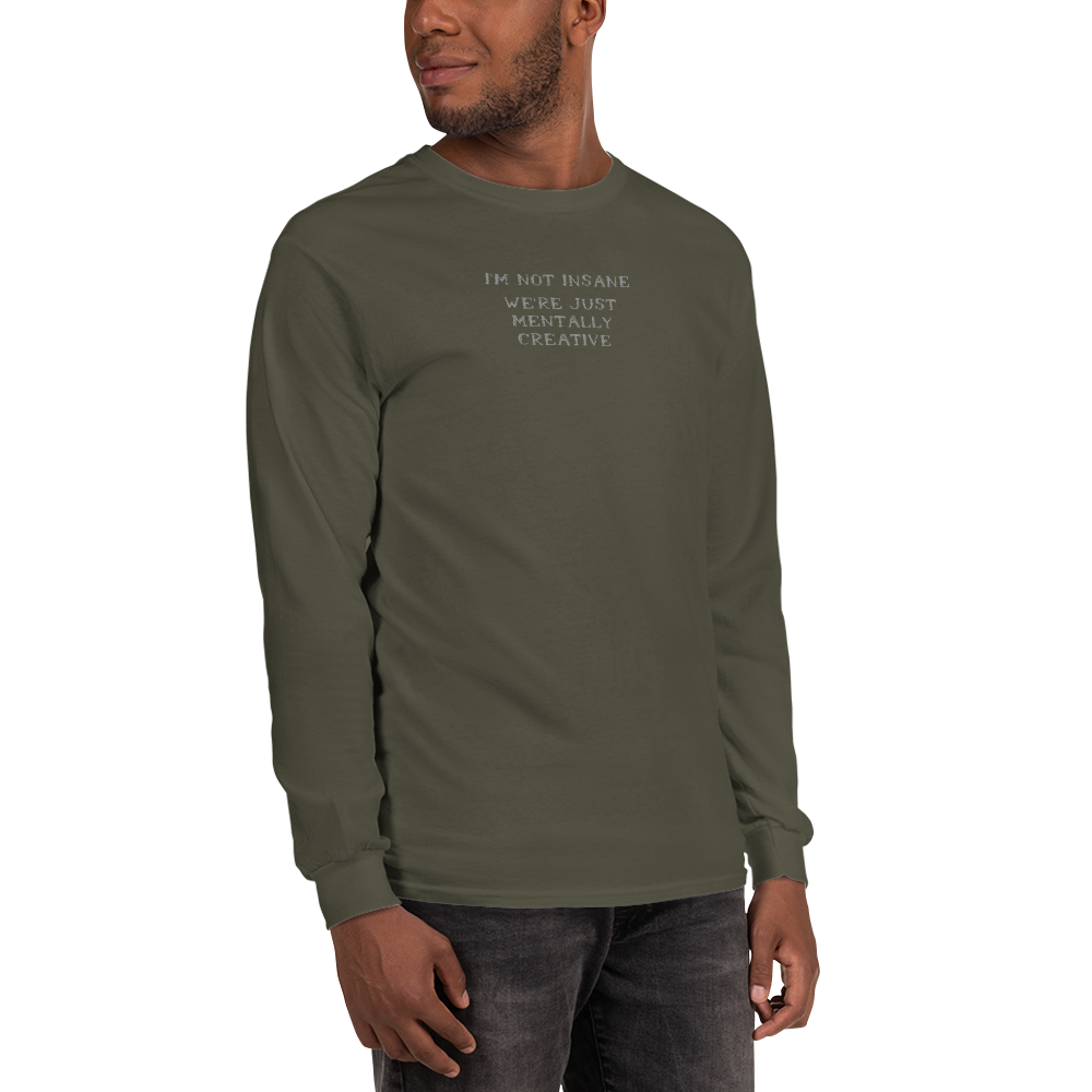 "I’m not insane   We’re just mentally creative" printed on a military green men's long sleeve shirt worn by a male
