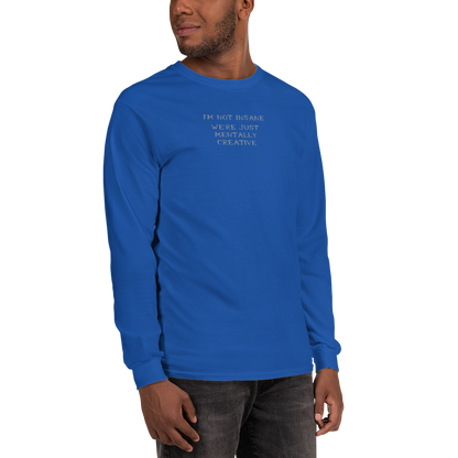"I’m not insane   We’re just mentally creative" printed on a royal men's long sleeve shirt worn by a male