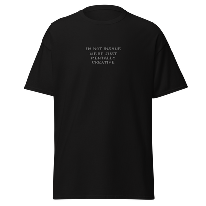 "I’m not insane   We’re just mentally creative" printed on a black on an invisible body