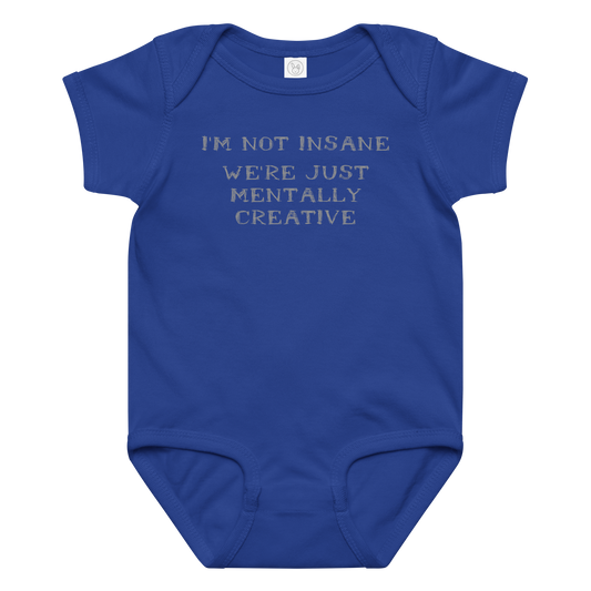"I’m not insane   We’re just mentally creative" printed on a royal baby jersey bodysuit laying on a flat surface amongst other clothes