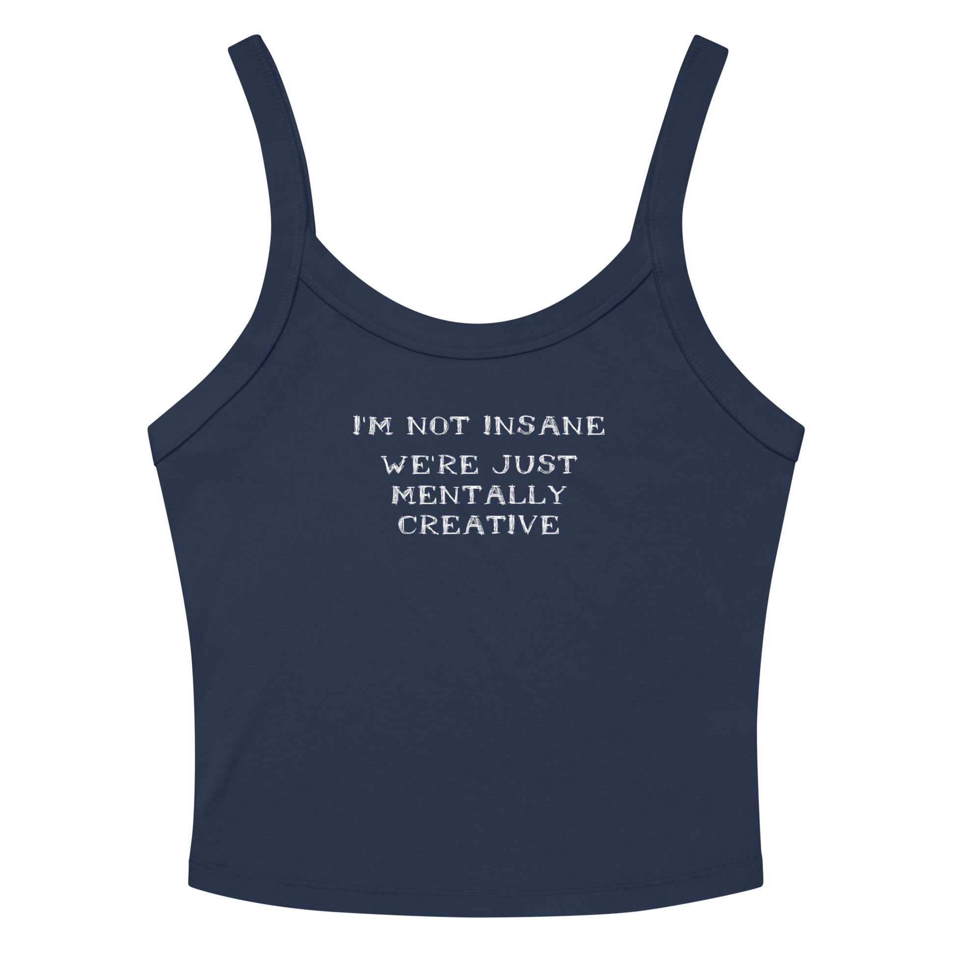 "I’m not insane   We’re just mentally creative" printed on a solid navy blend women's micro-rib tanktop laying on a flat surface amongst sunglasses and shorts