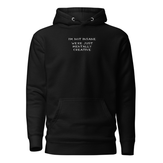 "I’m not insane   We’re just mentally creative" printed on a black on an invisible / simulated body