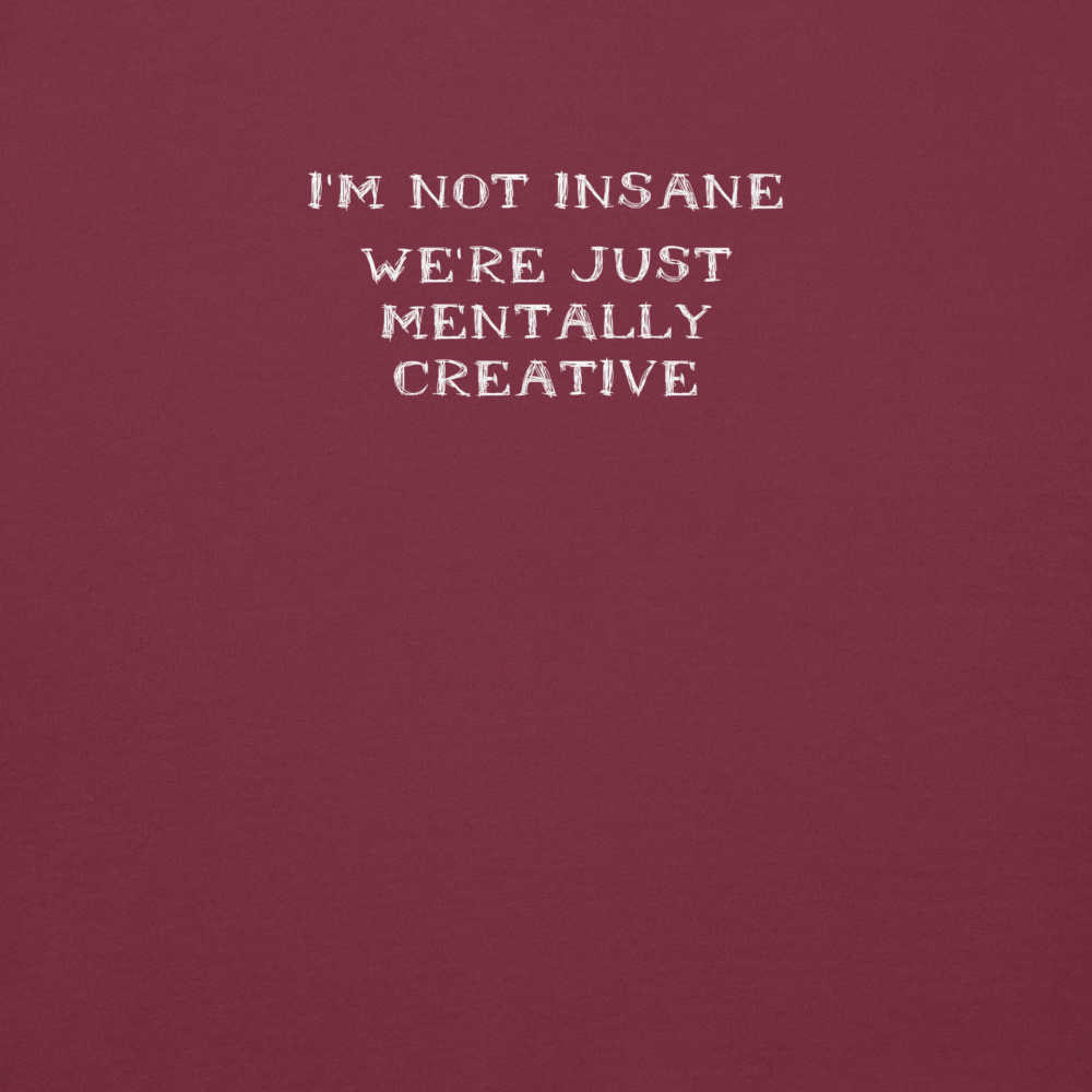 "I’m not insane   We’re just mentally creative" printed on a maroon background