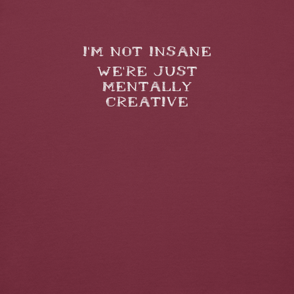 "I’m not insane   We’re just mentally creative" printed on a maroon background