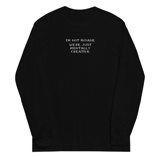"I’m not insane   We’re just mentally creative" printed on a black men's long sleeve shirt laying on a flat surface