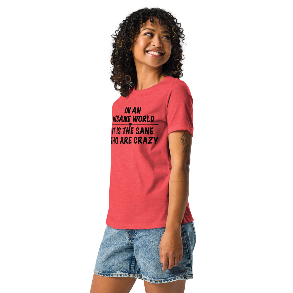 "In an insane world, it is the sane who are crazy" printed on a heather red women's relaxed t-shirt worn by a female